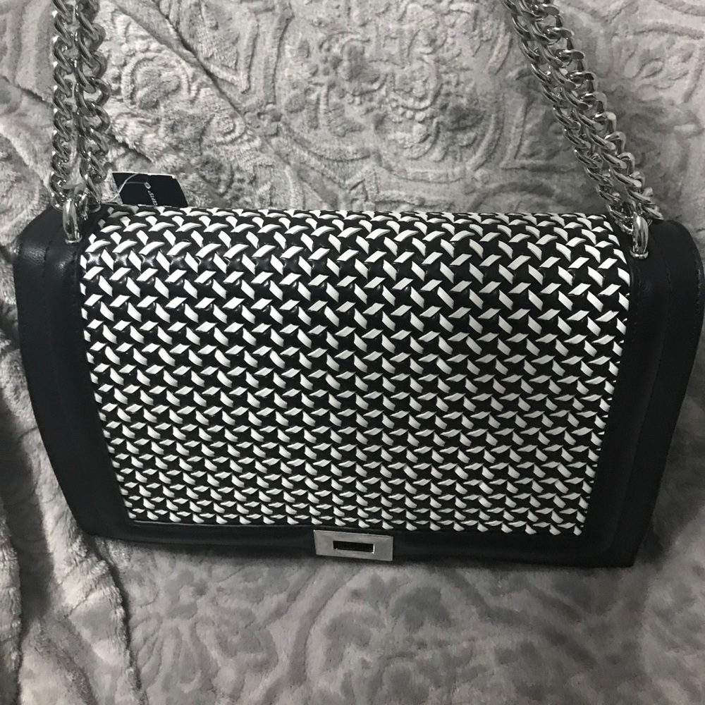 Brand new INC pocketbook